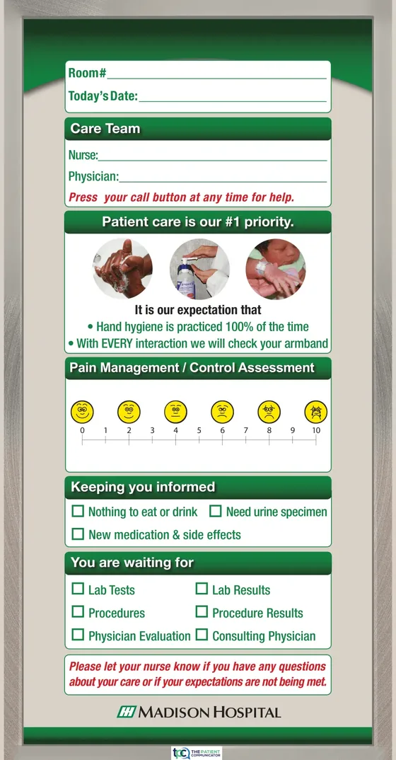 A tall vertical Madison Hospital communication board, with room number and date at the top, then care team, hand hygiene expectations, a pain assessment scale, a keeping you informed panel and a you are waiting for checklist