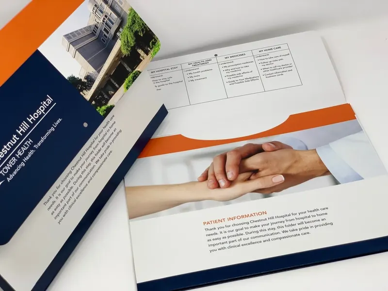 Open Chestnut Hill Hospital folder showing its printed interior and a tabbed checklist insert