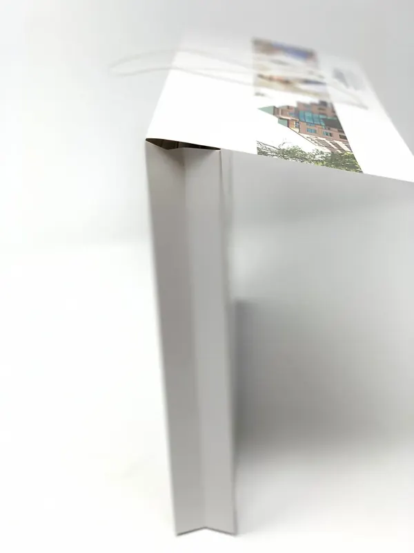 Side view of a Colbert Regional Memorial Hospital folder showing its expandable spine