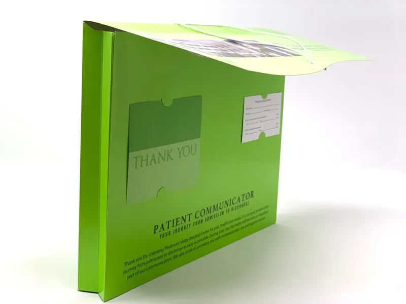 Piedmont Valley Medical Center folder standing upright with its thank-you card pocket and appointment card