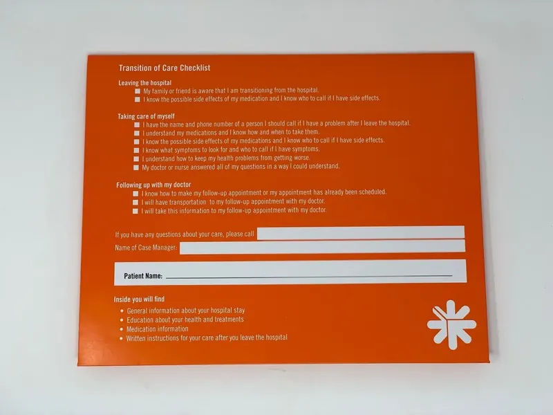 Back panel of the SoutheastHEALTH folder, printed with a transition of care checklist and a patient name field